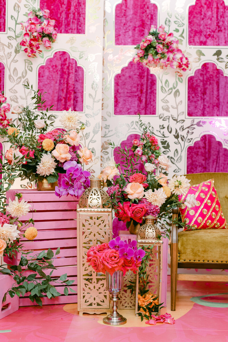 pink and red wedding decor of boxes and floerals