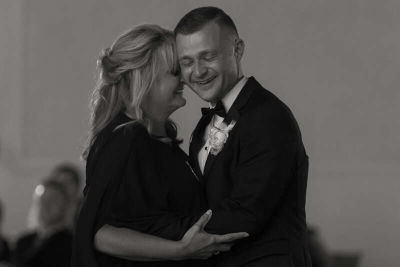 groom admires his bride after their first look