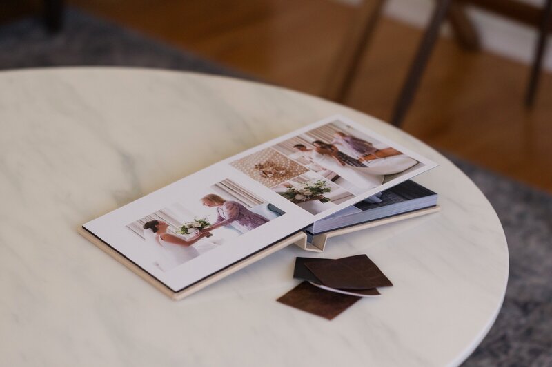 wedding album on marble coffee table