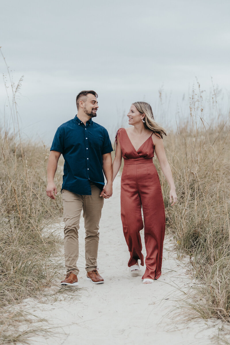 couple walking on hilton head beach