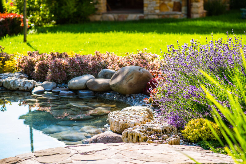 A welcoming outdoor space featuring a spacious patio, cozy seating, and lush landscaping, perfect for family gatherings and hosting friends.