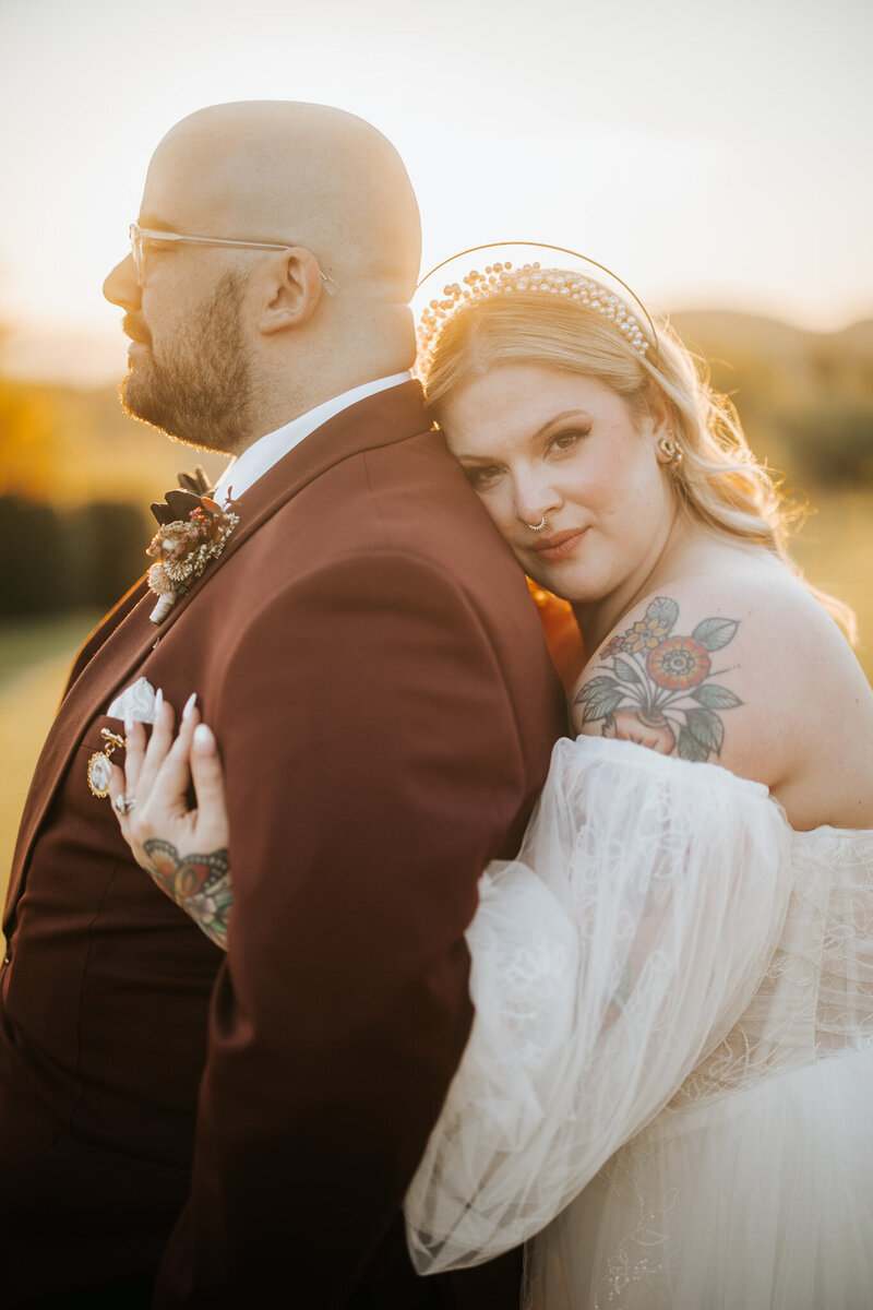 Couple in love on their wedding day in Italy, with the timeless beauty of the Dolomites as a backdrop.