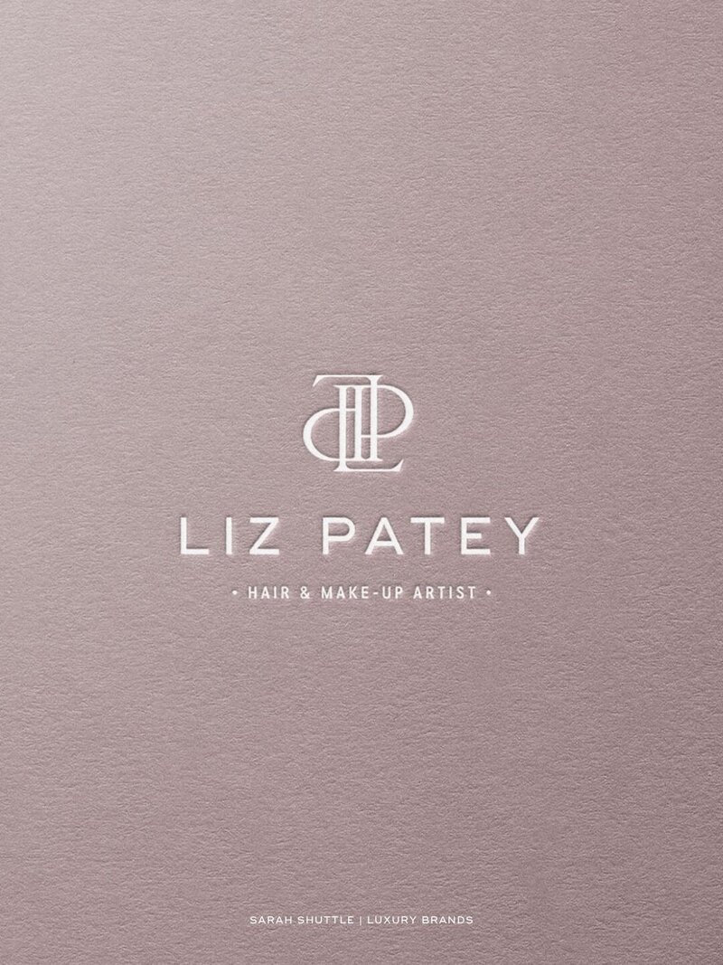Bespoke Liz Patey luxury beauty brand logo debossed on blush pink textured background
