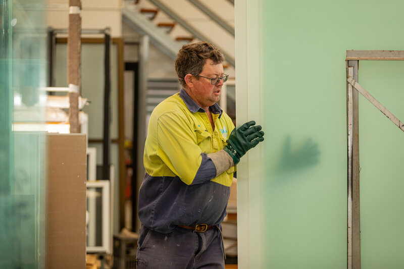 Skilled glazier crafting durable glass and aluminium products for residential and commercial projects in Roma QLD.