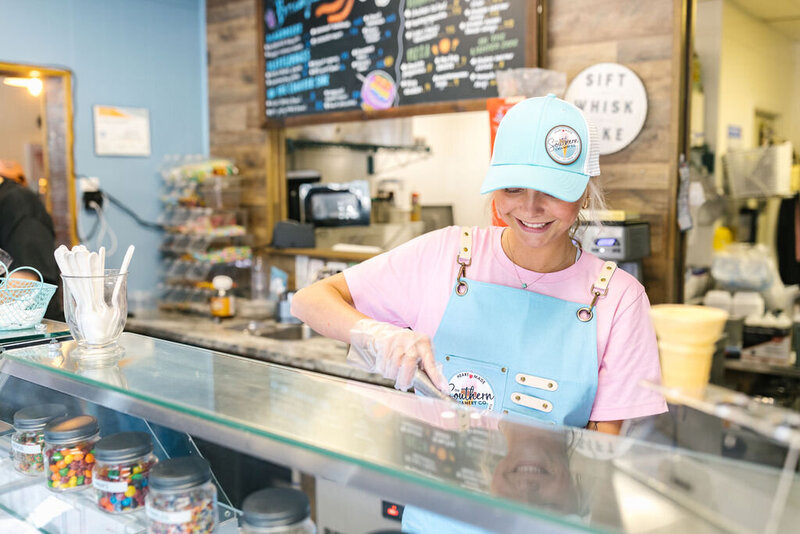 girl scooping ice cream