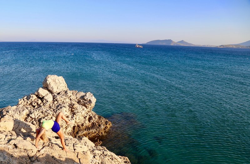 Yoga Teacher Practices Wheel Pose on Greek Island