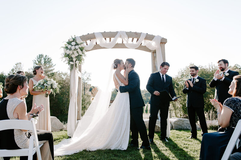Bride and Groom Winery Vineyard Ceremony First Kiss