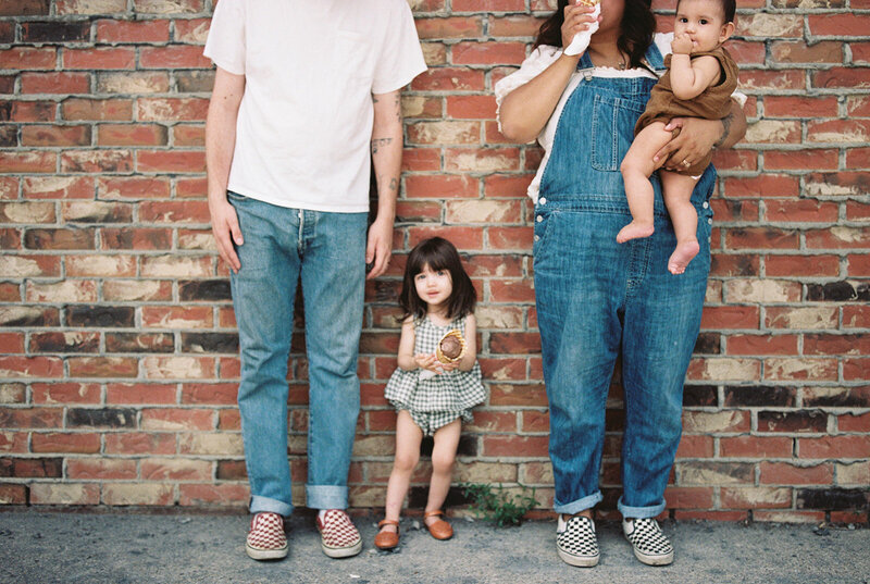 family walking out to a field together
