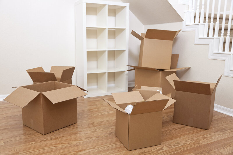 Photo of Moving Boxes in a Room