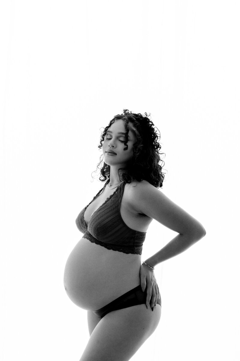 Maternity photography pregnant woman with white background in Tampa Bay, Florida Nadine B Photography