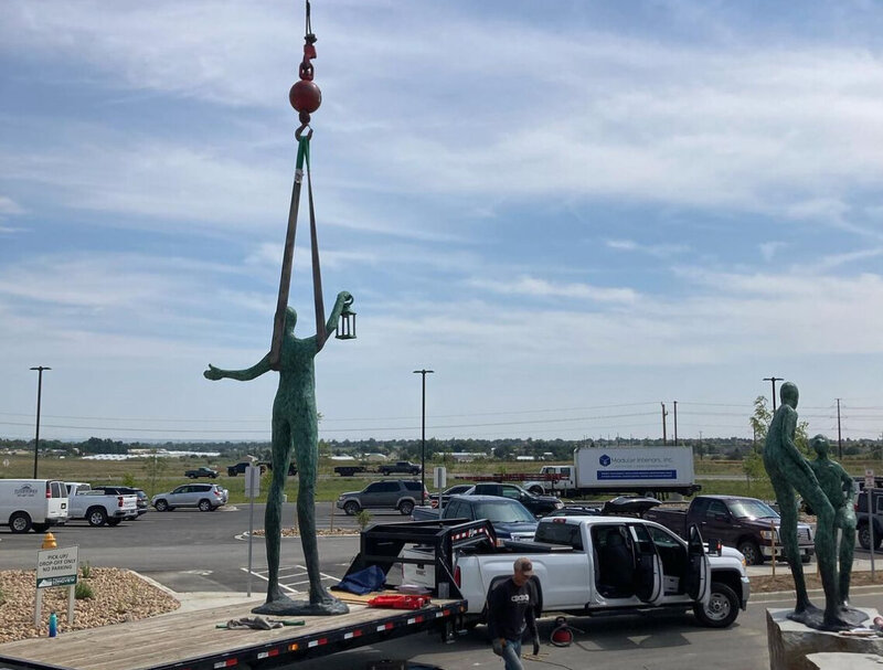 Expert sculpture installation by crane service in Denver Metro and Foothills