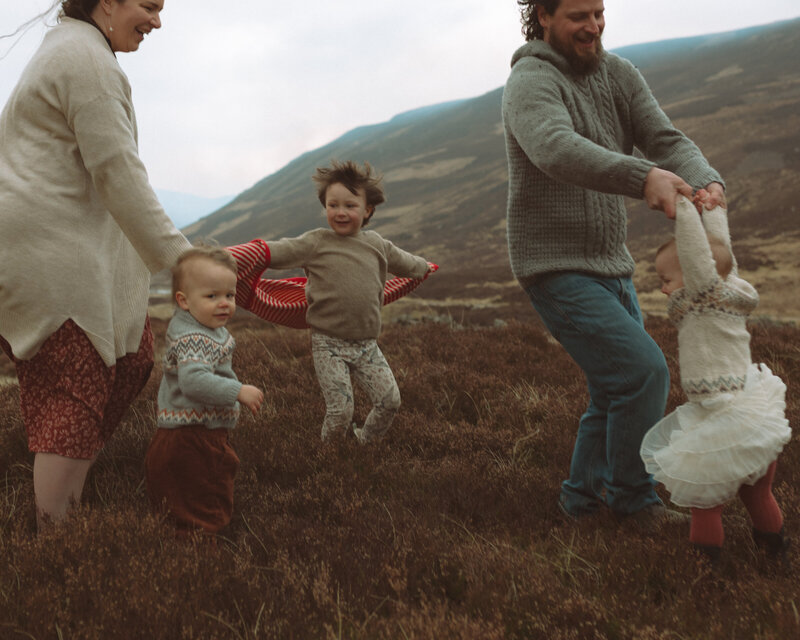 family playing in the grass in aberdeen