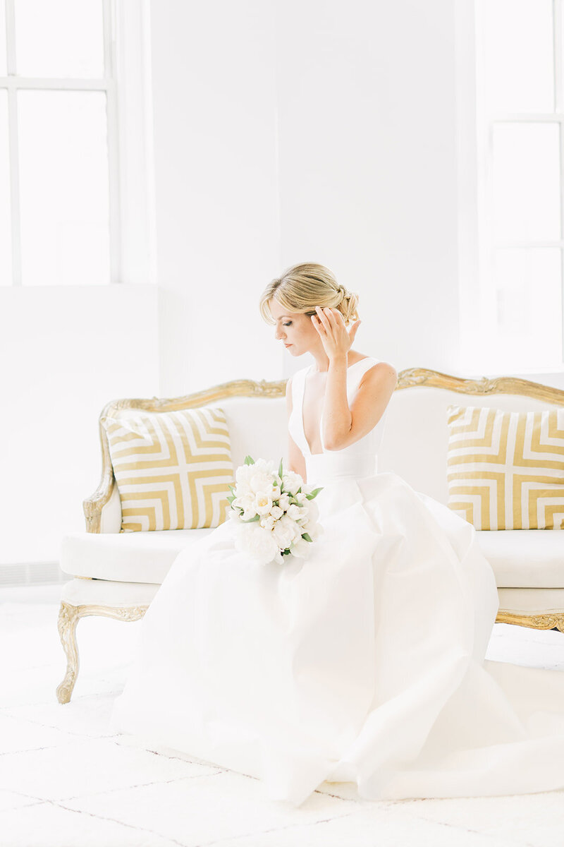 Bride on vintage sofa