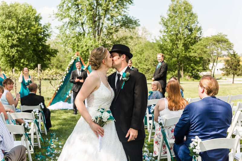 Stunning couples portraits captured by Style & Grace Photography in Silex, MO, showcasing the love and connection between the newlyweds in a beautiful outdoor setting.