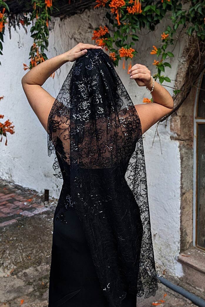 black sparkly veil and black wedding dress