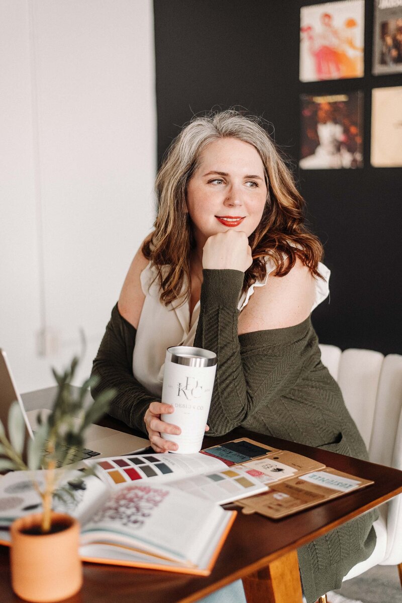 woman scrolling her phone texting