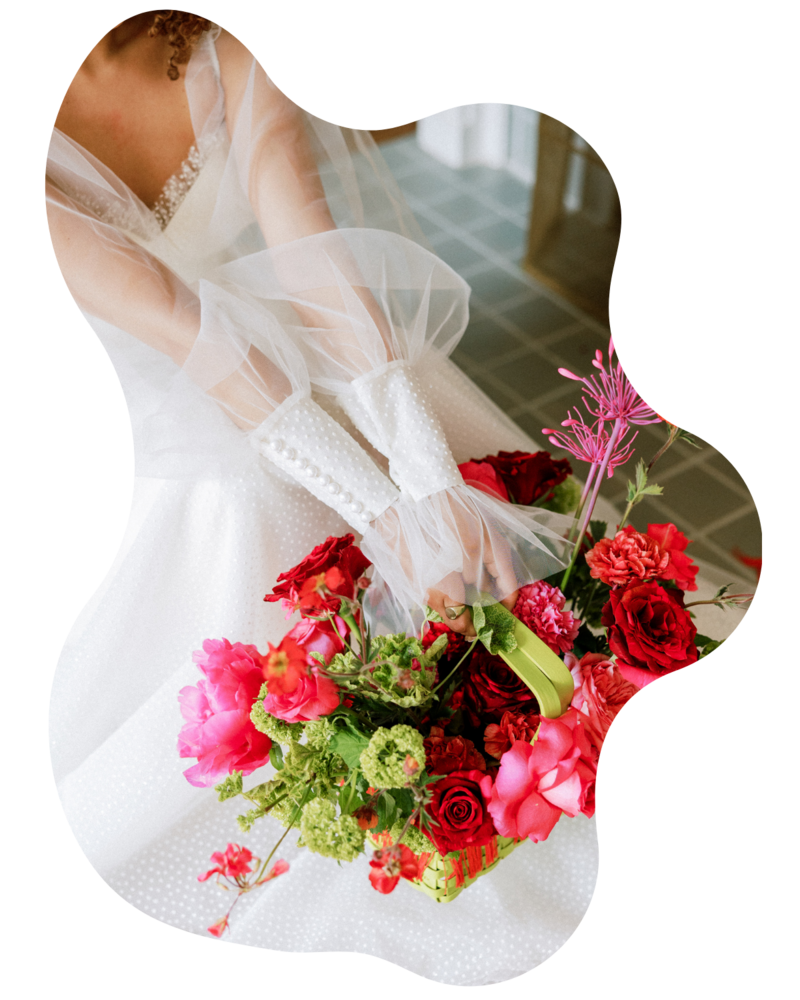 Large-scale wedding floral installation featuring bold colors and sculptural design. A signature look by The Floral Eclectic, known for creating unforgettable event experiences in Dallas/Fort Worth.