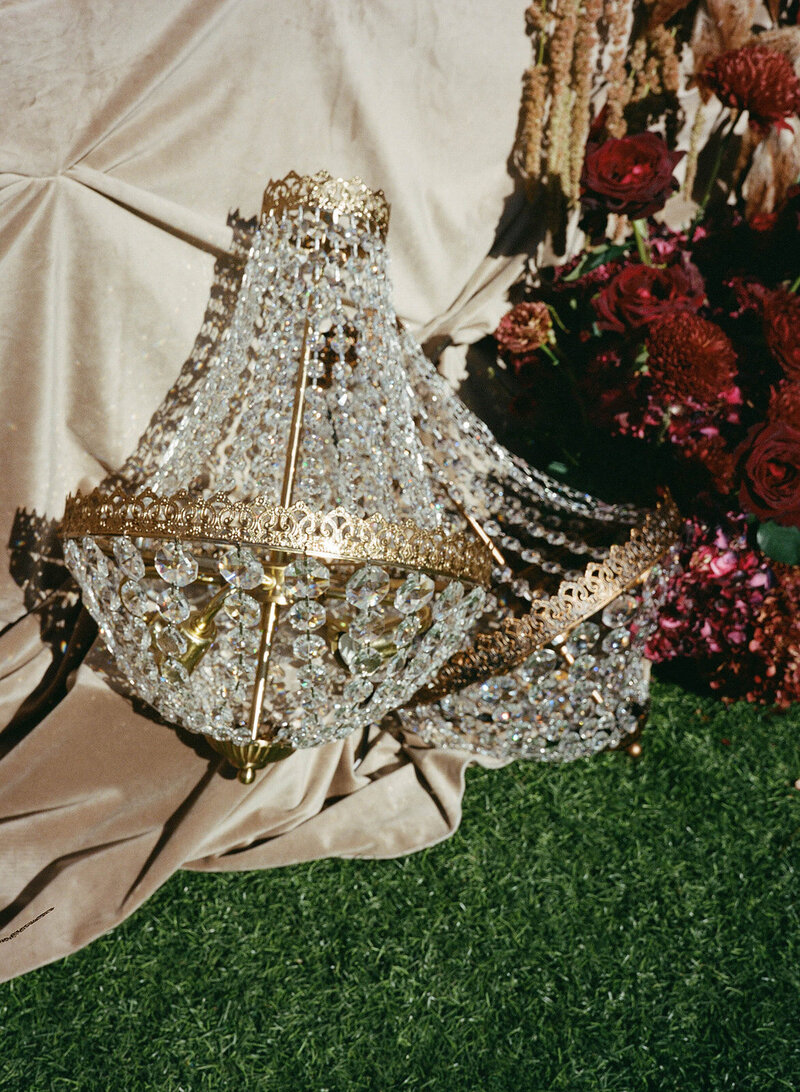 Elegant chandelier used as wedding décor display styled by Arizona wedding planner