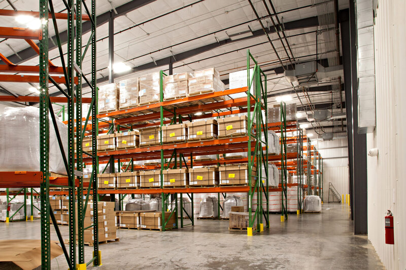 Warehouse filled with metal shelving