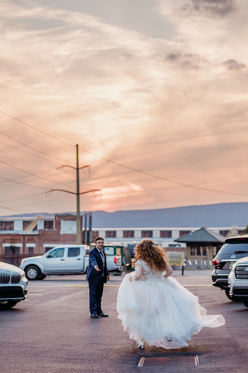 Bride runs to her groom at sunset