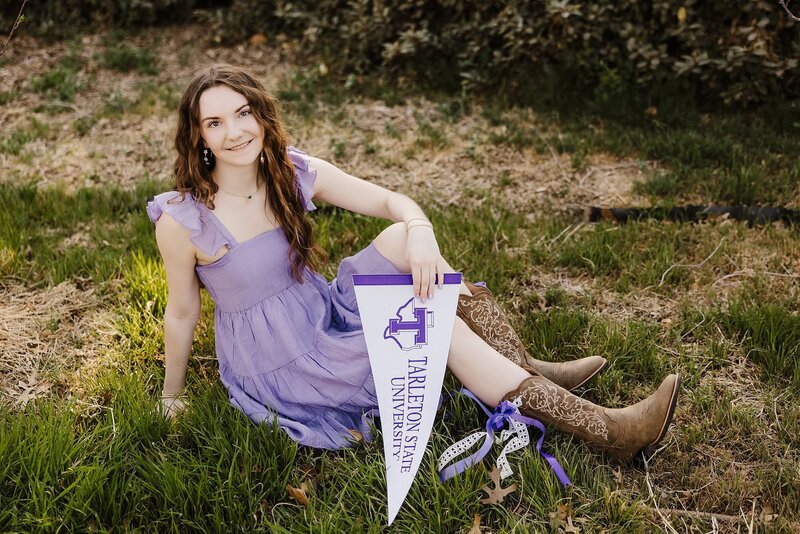 Lubbock senior in a purple dress and brown boots,  representing Tarleton State University, image captured by Mary Wiebe Photography