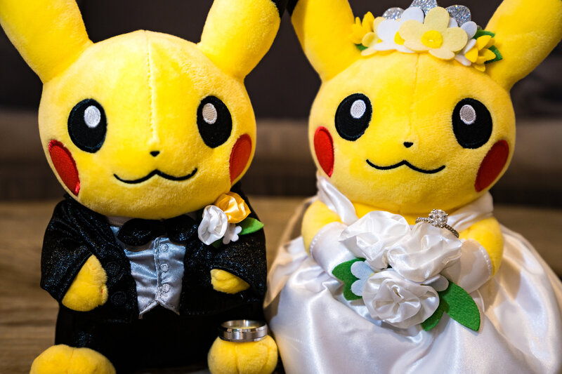 Pikachu Pokemon Groom and Bride with Rings, nerdy wedding inspo.