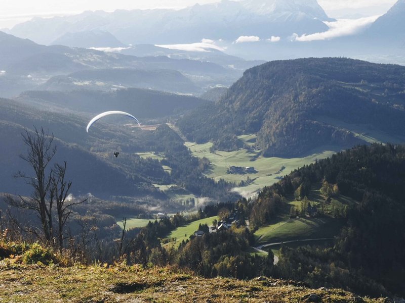 Austrian Mountains and man with parachute