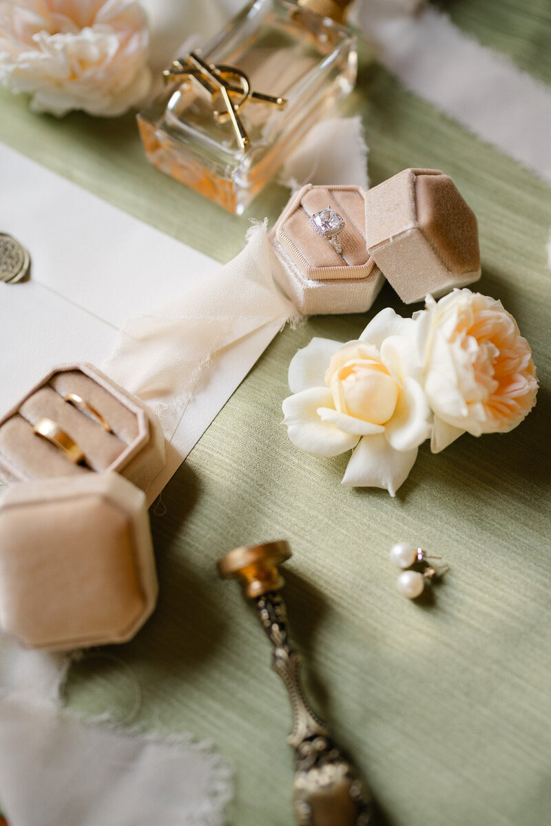 Destination wedding bridal flat lay in sage and ivory