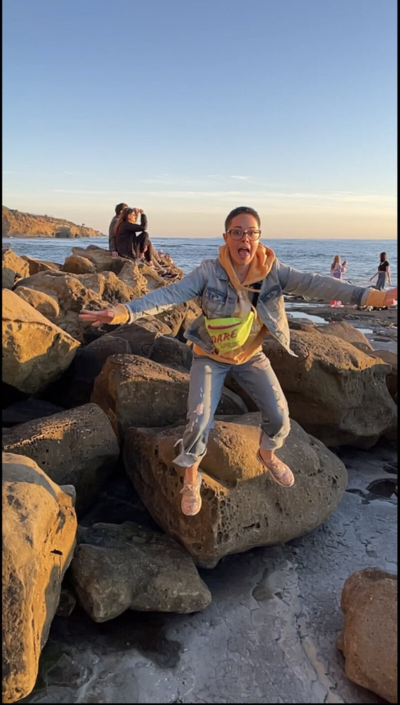 Lauren jumping off rocks in California