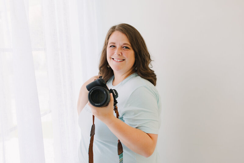 Professional headshot of Jennifer L. Kirk, an Allen, Texas family and newborn photographer known for capturing heartfelt, timeless portraits that celebrate connection, motherhood, and family legacy.