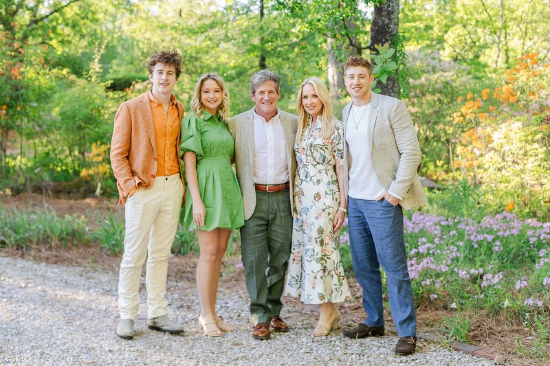 Family with adult children posing at Auburn family session