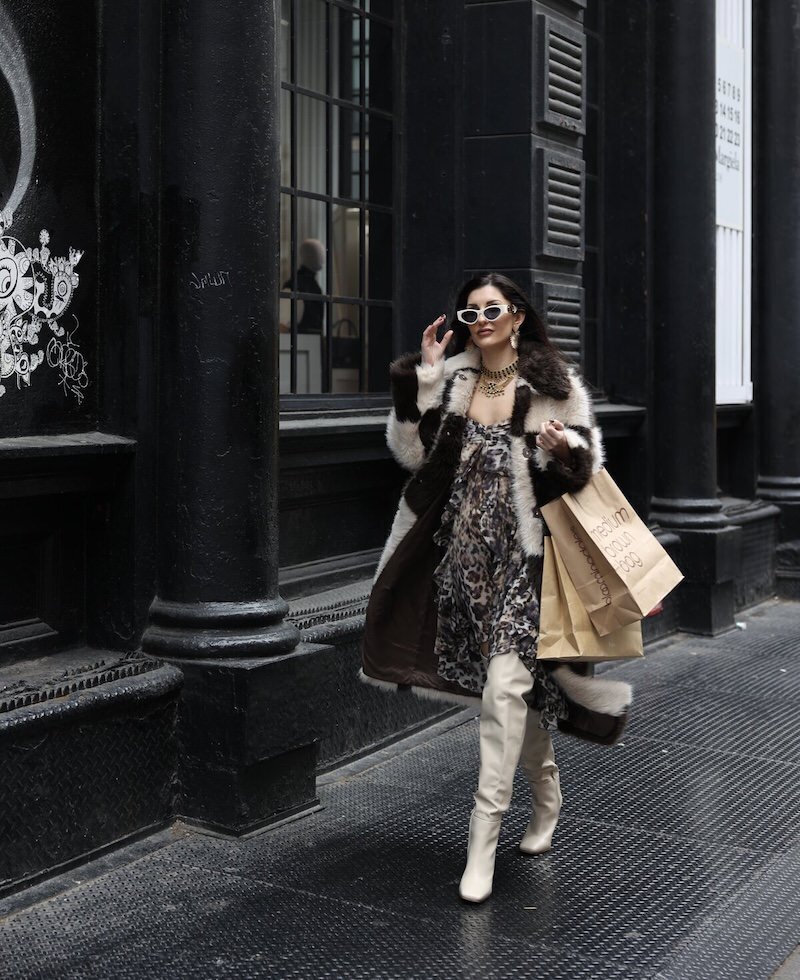 Personal shopper holding bag
