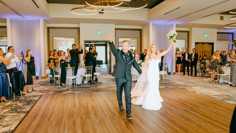 Bride and Groom grand entrance, promontory club park city utah taken by Cali Warner Media