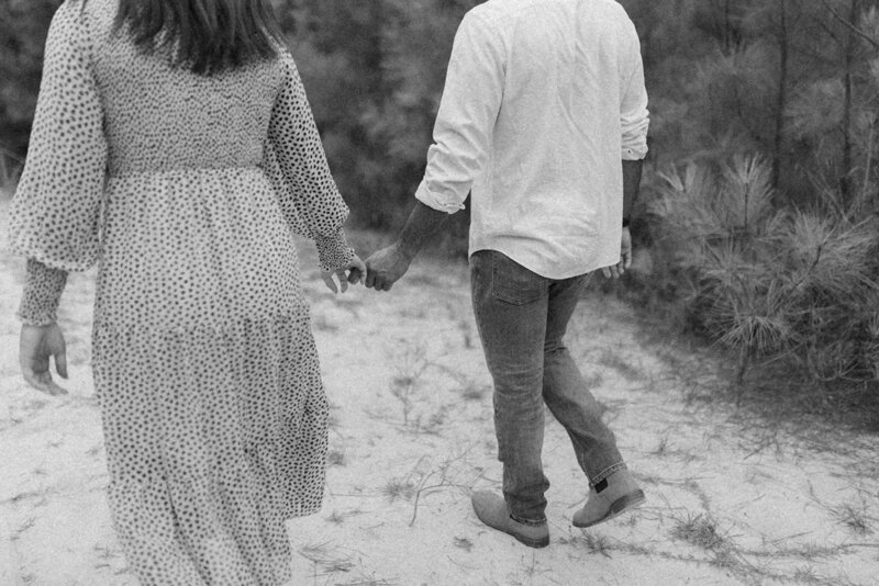 Couple walking and holding hands
