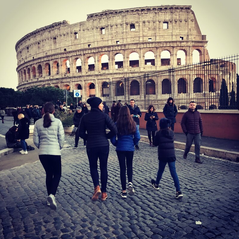 Brad and his family at the Colosseum