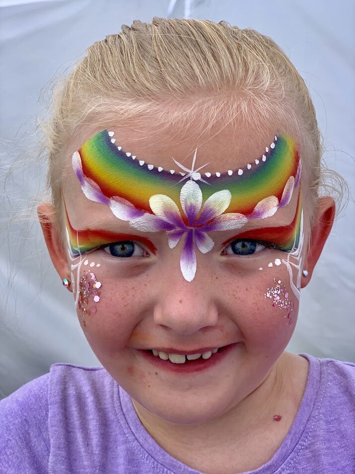 girl with princess crown face painting