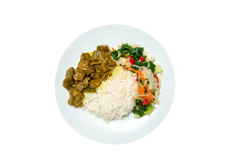 Curry goat, white rice, and steamed vegeatables.