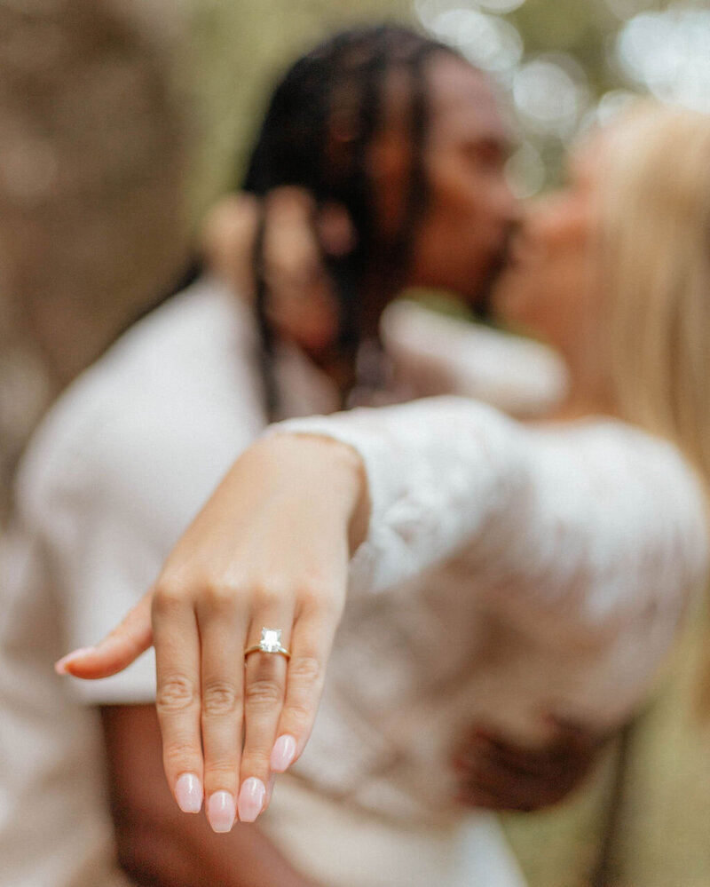 woman showing engagement ring