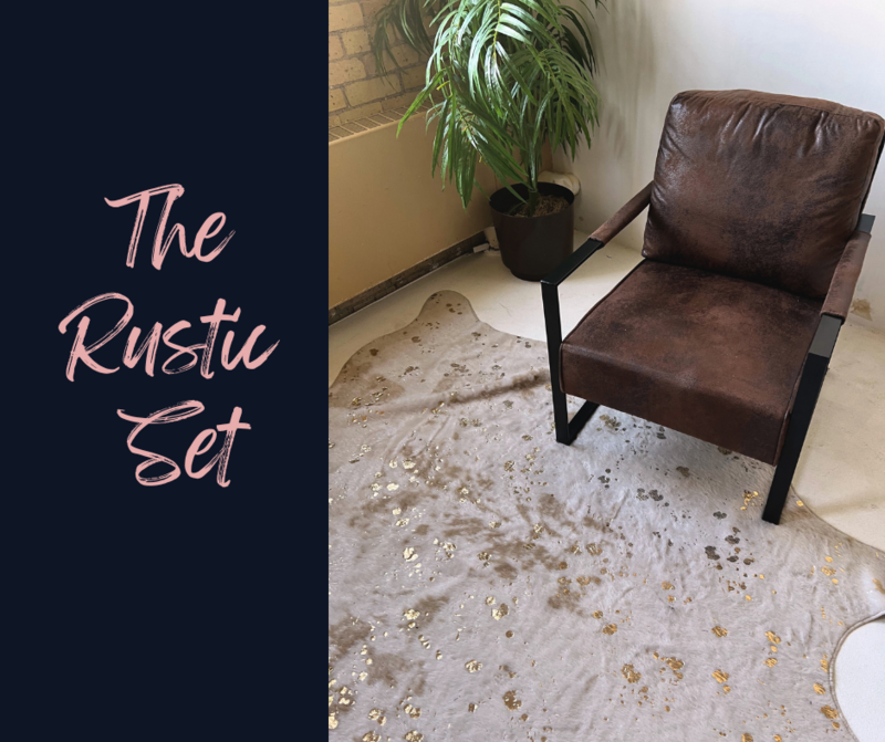 brown leather chair and gold flecked cow hide rug to pos on for a boudoir session in Minneapolis Mn