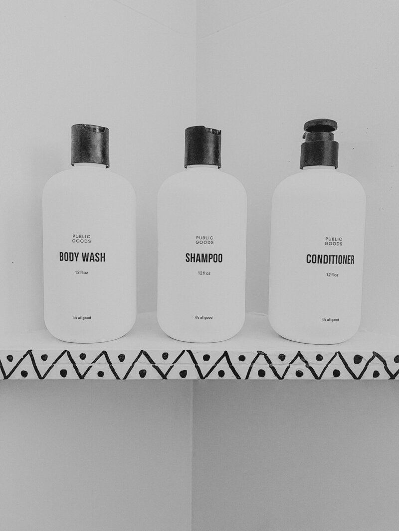 modern toiletries on a tile counter