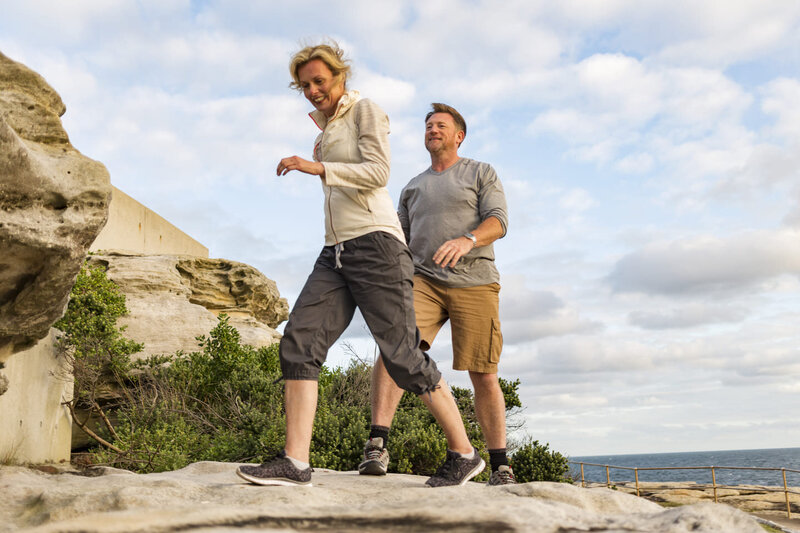 couple hiking on rocks