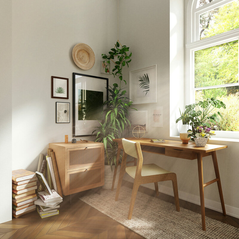 Minimalist home office with indoor plants and framed artwork