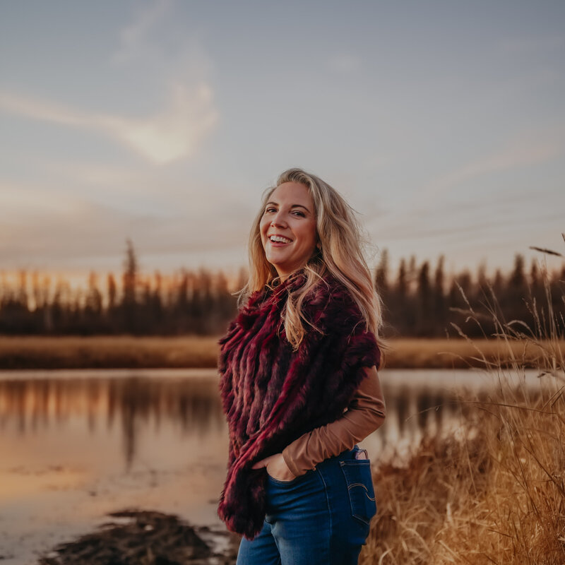 mom holding toddler edmonton flower garden at family photo shoot