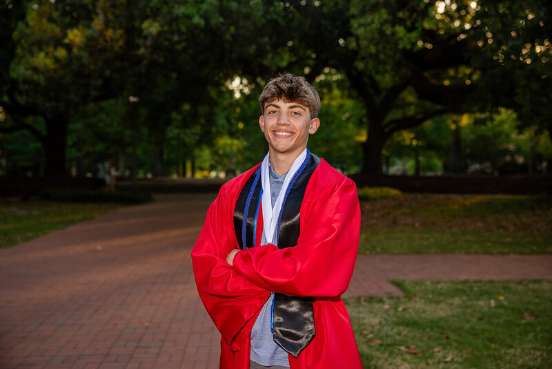 A girl posing for her senior portrait in Columbia, South Carolina