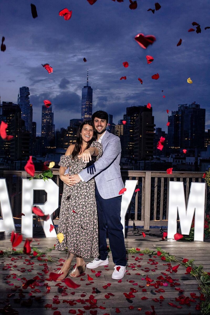 Jared & Jessica's Proposal-with-rose-petals-Prince's-Loft copy