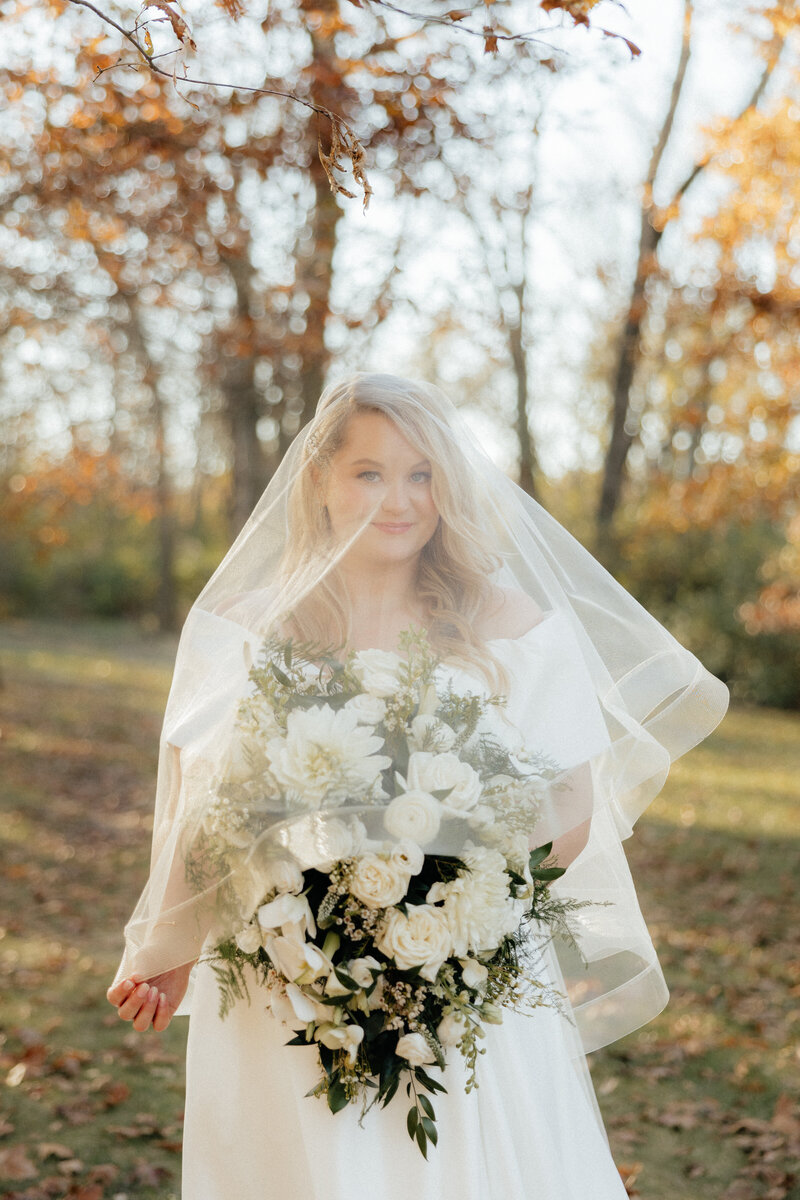 The bride beneath her veil.