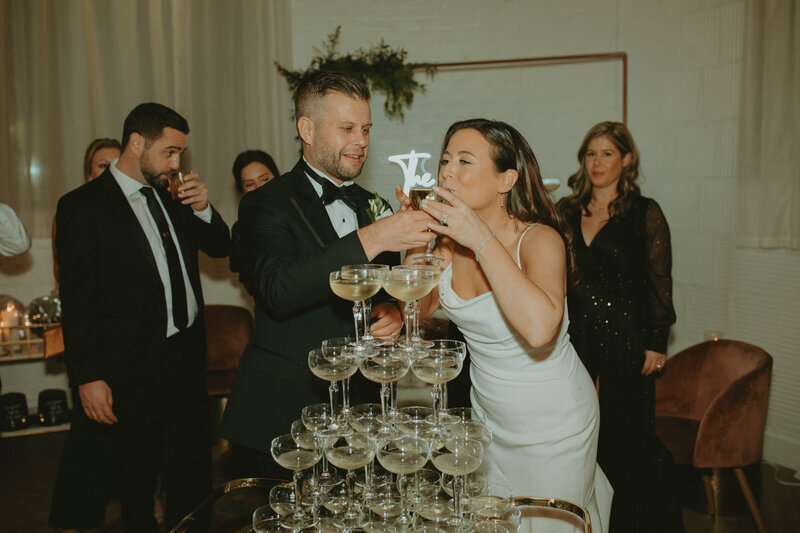 couple with champagne tower philadelphia pa wedding