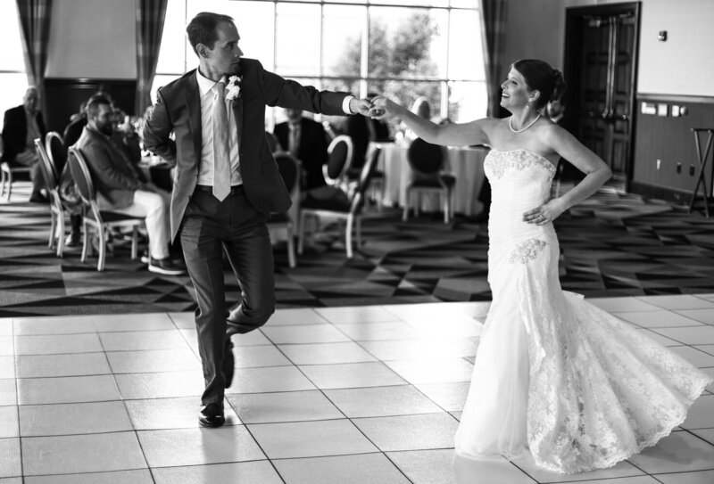 Couple dance at their Sheraton Erie Bayfront Hotel wedding reception