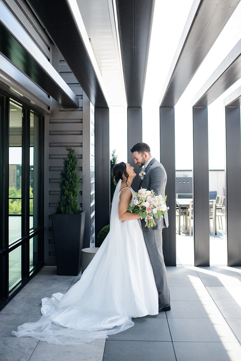 Bride and groom walk up memorial steps at their DC wedding