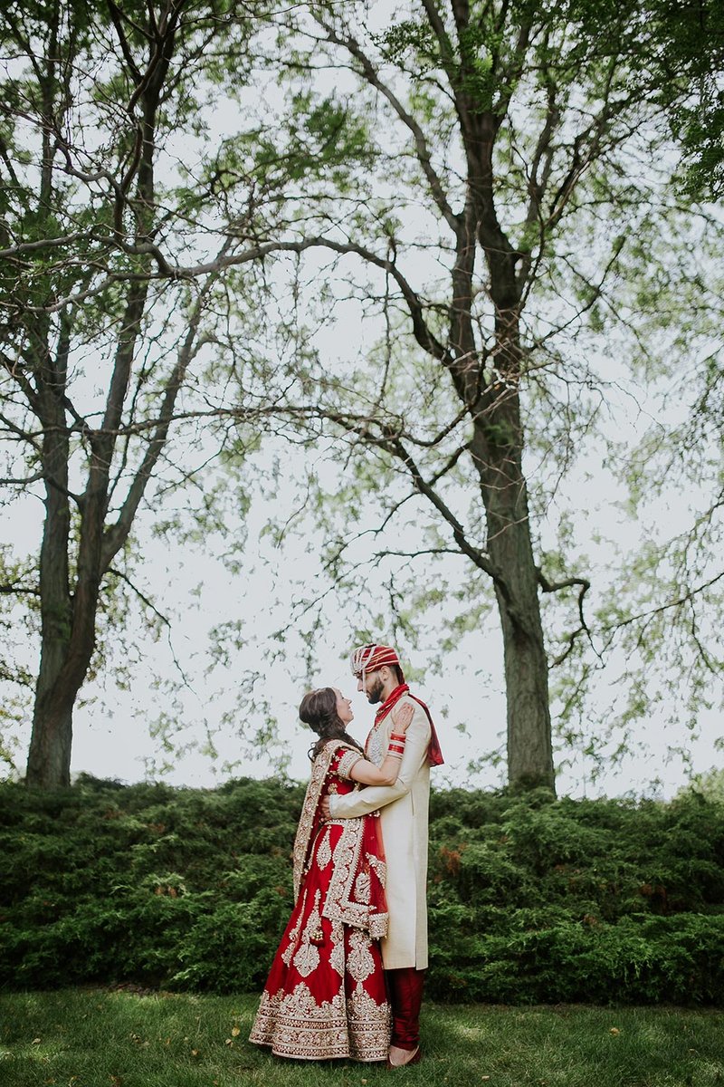 Two people kissing after their wedding in Muncie Indiana